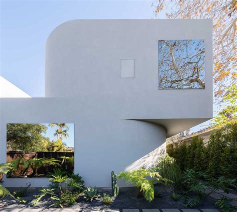 Pentagon Designs Radius House With Sharp Angles + Curved Surfaces