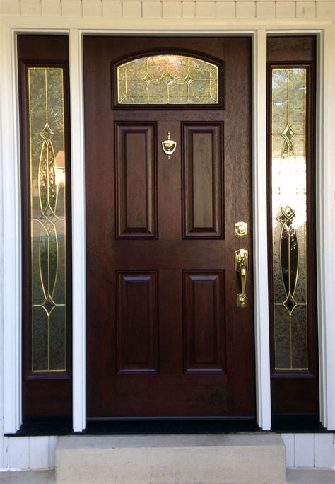 Provia Signet Mahogany with emerald glass. | Wooden front doors, Front entry doors, Door design