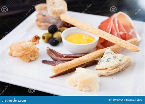 Tapas platter with ham stock photo. Image of lomo, meal - 104929954