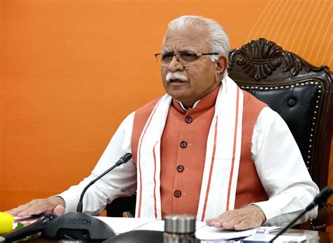 Haryana CM greets people, does yoga in home