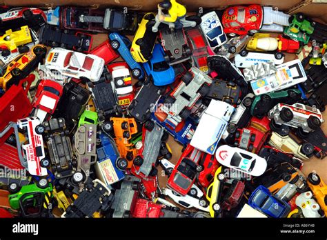 A box full of small toy cars for sale at a car boot sale Stock Photo ...