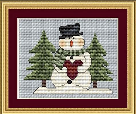 Más de 25 ideas increíbles sobre Snowman cross stitch pattern en Pinterest