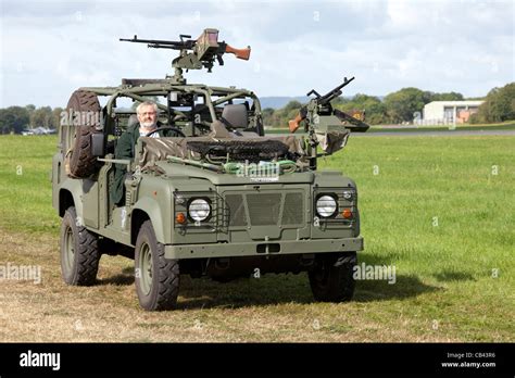 Land Rover Defender in the Military parade at Dunsfold Wings and Wheels ...