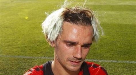 Antoine Griezmann returns to Atletico Madrid with bizarre new hairstyle ...