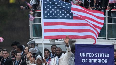 LeBron James, Coco Gauff Hoist American Flag on Team USA Boat At Olympics