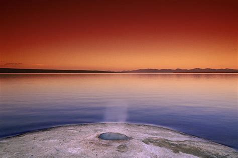 Yellowstone Lake and Geyser Photograph by Rich Franco | Fine Art America