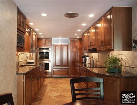 corridor kitchens | : Mesmerizing Rich Brown Kraftmaid Cabinetry In Corridor Kitchen … | Galley ...