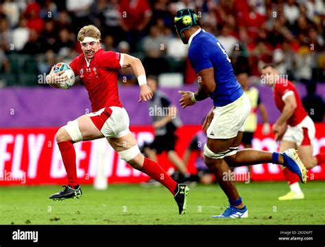 Wales' Aaron Wainwright (left) on his way to score his sides first try during the 2019 Rugby ...