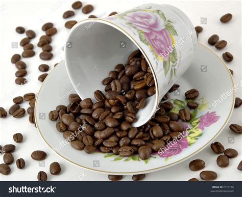 Fancy Coffee Cup And Saucer With Coffee Beans Stock Photo 2373780 : Shutterstock