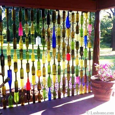 22 Glass Recycling Ideas to Reuse and Recycle Empty Bottles | Bottle wall, Wine bottle fence ...