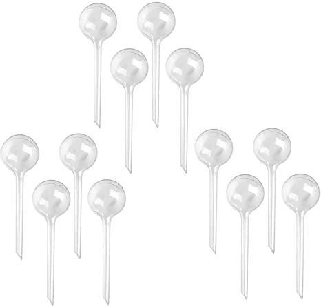 six white lollipops are lined up together