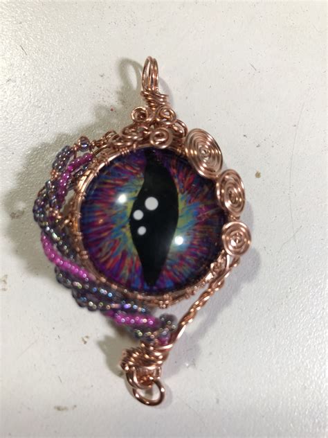 Pin on Dragon eye pendants