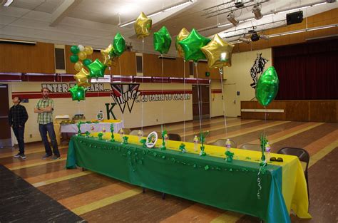 Track and Field sports Banquet. Coaches table had arch of balloons in ...