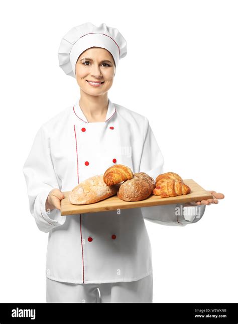 Female chef with bakery products on white background Stock Photo - Alamy