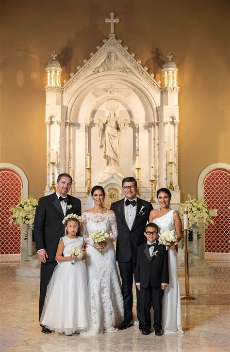 Family portrait at St. Ann Catholic Church in West Palm Beach, Florida before heading to The ...