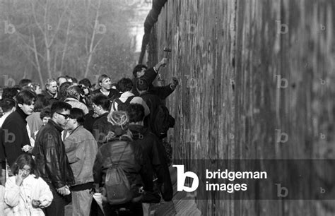 Reunification of Germany, Fall of the Berlin Wall, Germany, 1989: destruction of the wall in ...