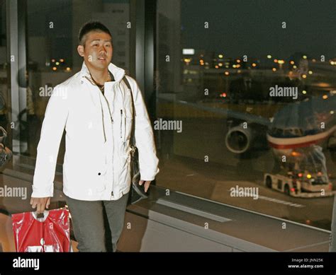 NARITA, Japan - Daisuke Matsuzaka arrives at Narita International Airport, northeast of Tokyo ...