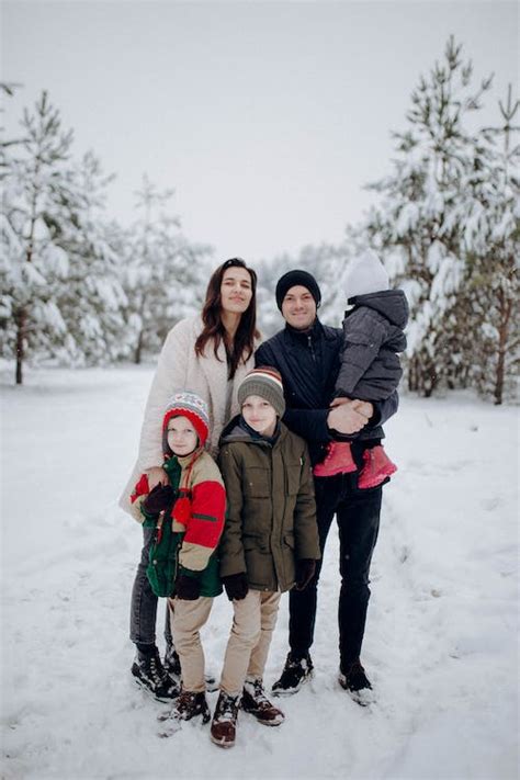 Family Portrait on Snow · Free Stock Photo