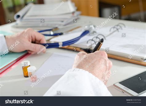 Doctor Writing Prescription Medical Office Stock Photo 303875690 ...