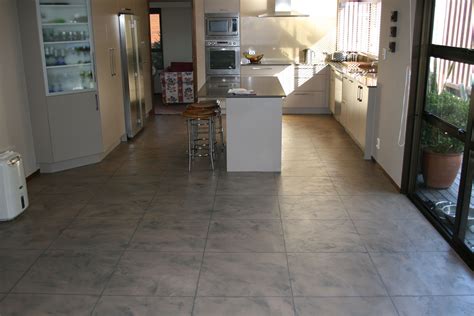 Cretecova decorative cement based overlay, over hardiflex (fibre cement sheet) on a wooden floor ...