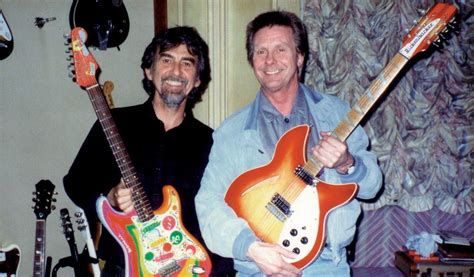 George Harrison holding his guitar named Rocky from the book 'Concert for George' | George ...