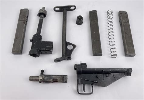 Sold Price: STEN SUB MACHINE GUN PARTS KIT W/ MAGAZINES - Invalid date MDT