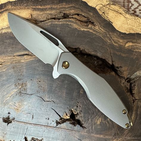 Koenig Knives Arius Frame Lock Patterned Titanium Handle Burnished ...