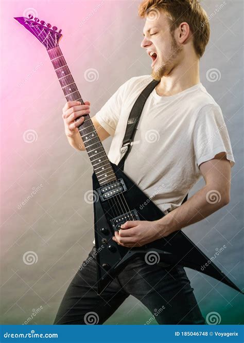 Man Playing on Electric Guitar Stock Photo - Image of hobby, playing ...