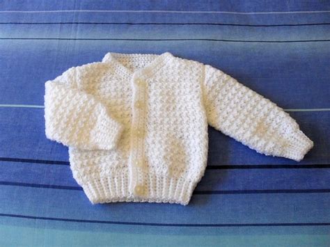 Ravelry: Unisex Baby Cardigan pattern by Cherry Fraser | Crochet baby sweater pattern, Crochet ...