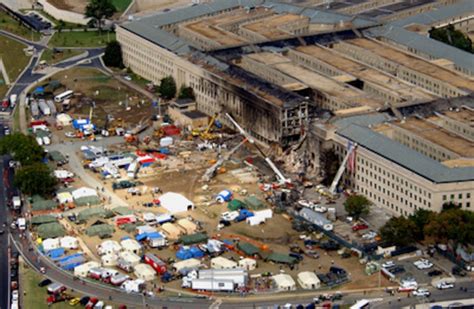 FBI agents, fire fighters, rescue workers and engineers work at the ...