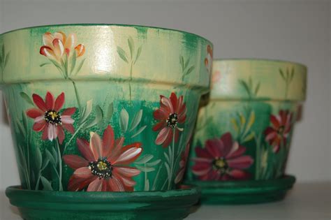 Set of two Hand Painted 7 '' wide clay flower pots