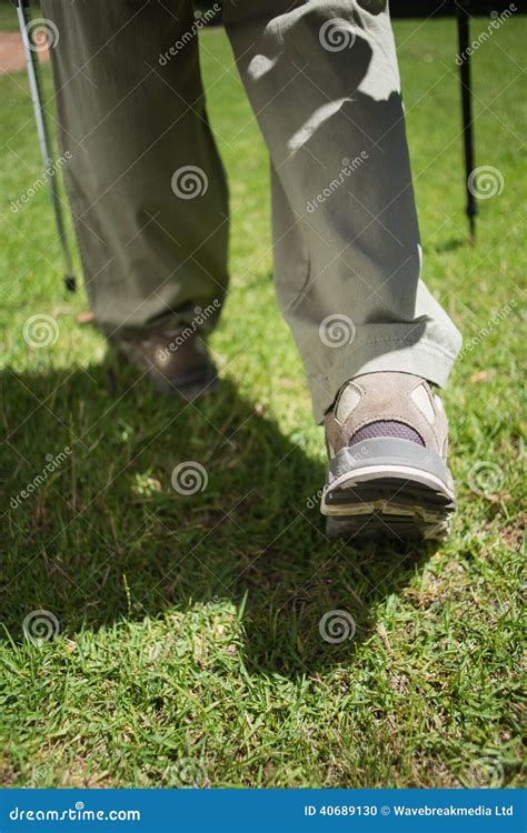 Womans Feet in Hiking Boots Walking on Grass Stock Photo - Image of ...