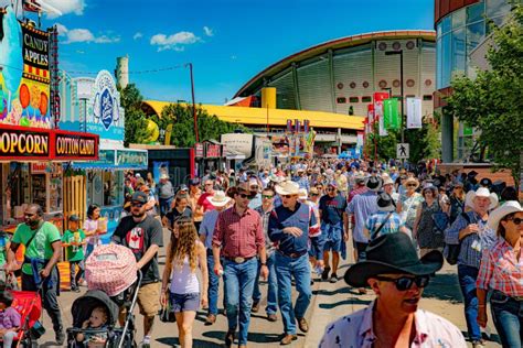 Calgary Stampede Annual Rodeo Festival in Canada with People Dressed As ...