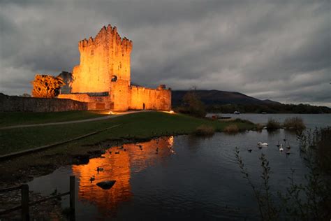 Ross Aglow | Ross Castle illuminated at dusk. | Denis Moynihan | Flickr