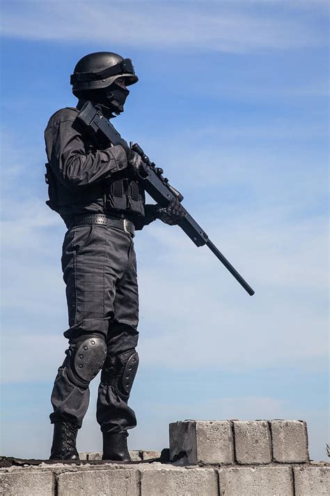 Swat Police Sniper In Black Uniform Photograph by Oleg Zabielin - Pixels