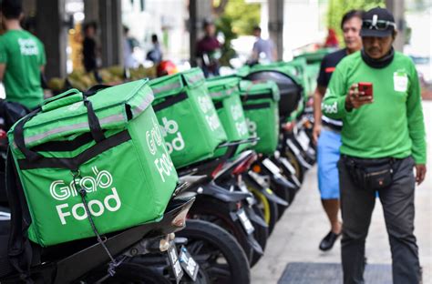 GrabBike Drivers Call For Change in Compensation & Support