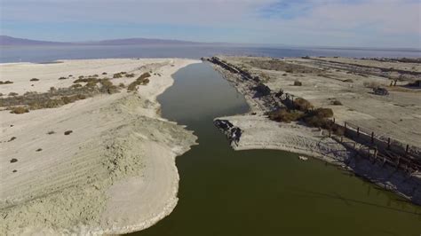 Salton Sea Desert Shores Drying up boat channel, rotting platform - YouTube