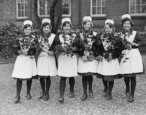 A group of uniformed girls at the Foundling Hospital at Redhill, Surrey ...