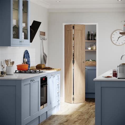 Fairford Blue Kitchen | Fitted Kitchens | Howdens | Oak bifold doors ...