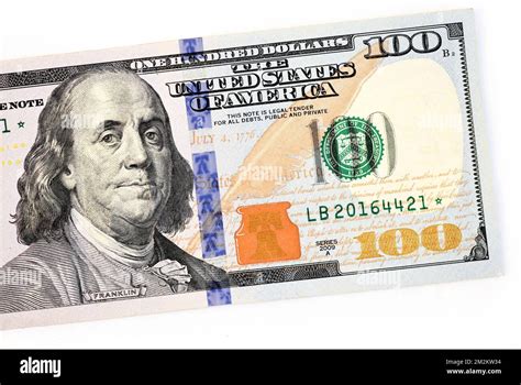 US 100 dollar bill featuring President Benjamin Franklin Stock Photo ...