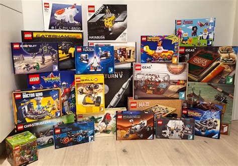 Lego Ideas boxes stacked up. Someday there will be enough space to ...