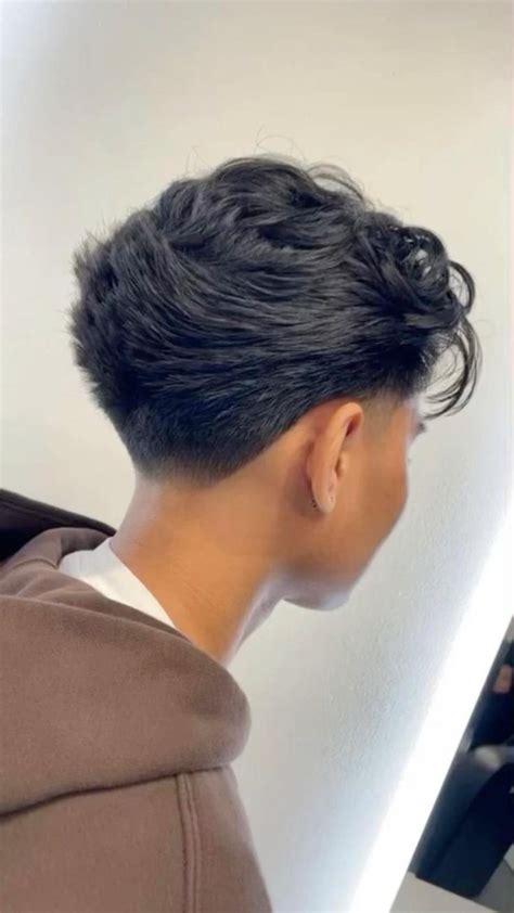 Middle part + blowout taper 🔥🥶 in 2023 | Mens hairstyles, Taper fade ...