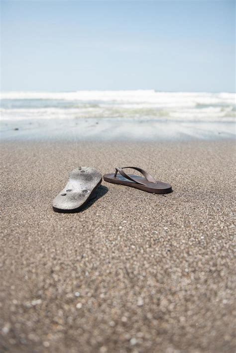 Flip flops on beach 9252272 Stock Photo at Vecteezy