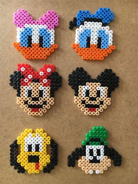 Perler Beads Mickey Mouse Cross Stitch in 2020 | Perler bead disney, Perler bead art, Easy ...