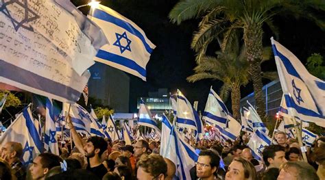 On Israel's 75th Independence Day, its flag has taken on new meaning as a protest symbol ...