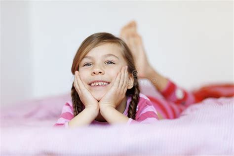 143 Portrait Cute Girl Lying Barefoot Bed Bedroom Stock Photos - Free & Royalty-Free Stock ...