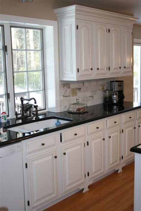 cabinets | Black kitchen countertops, Best kitchen cabinets, White cabinets black countertops