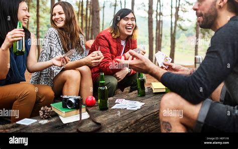 Friends Camping Playing Cards Concept Stock Photo - Alamy