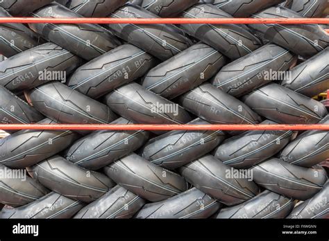 A rack of Pirelli Diablo Supercorsa motorcycle racing tires Stock Photo - Alamy