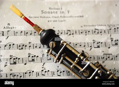 Oboe with sheet of music Stock Photo - Alamy